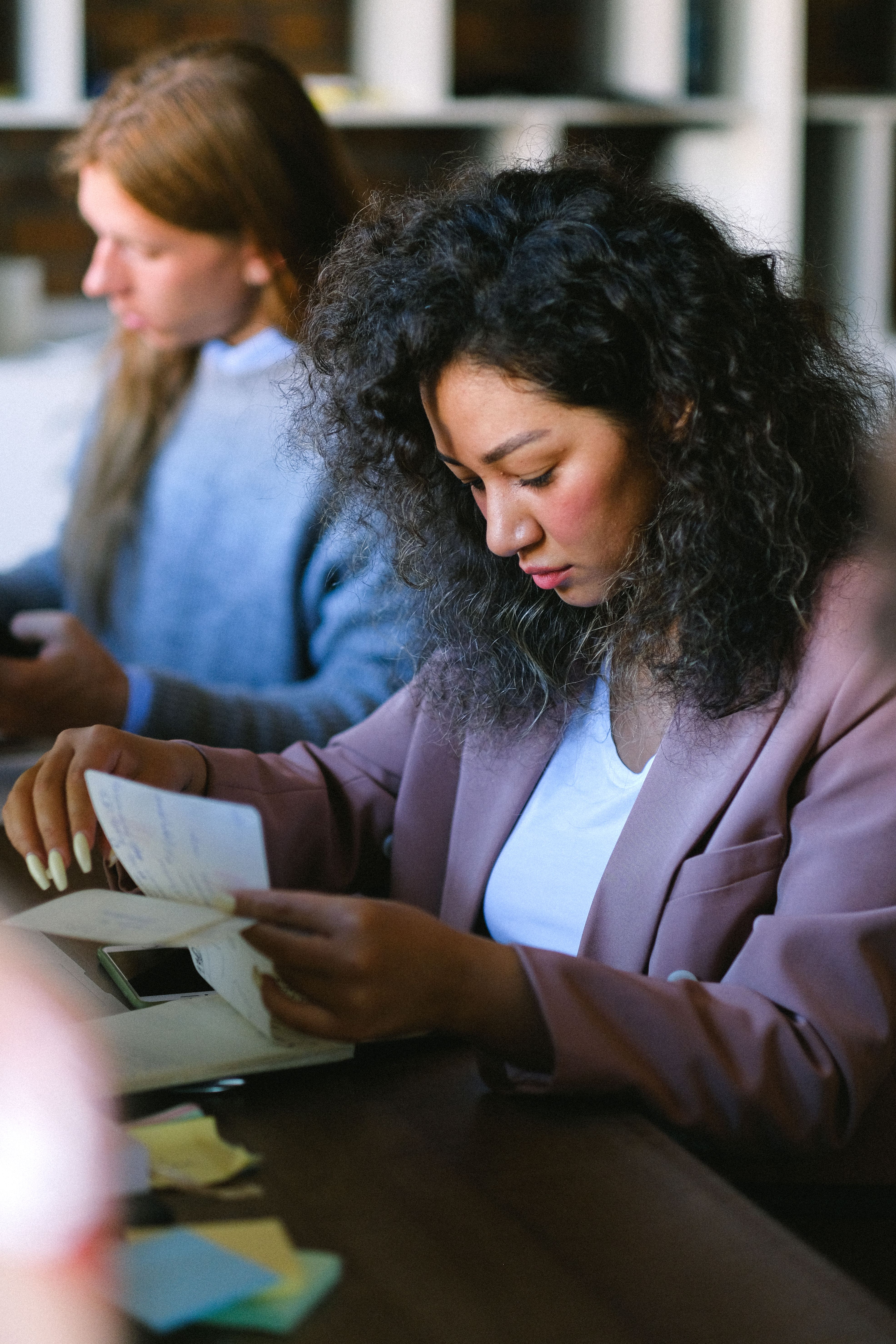 A person reviewing paperwork — illustrative photograph